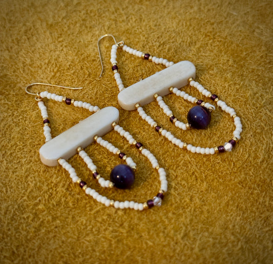 Cat eye swinging dangle
