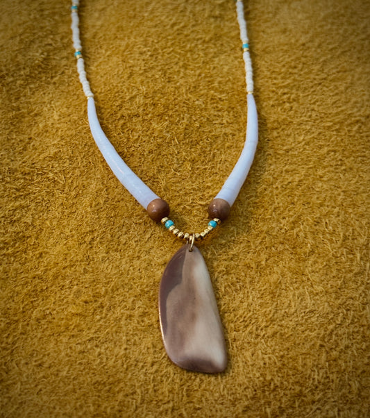 Fossilized walrus ivory pendant with mammoth ivory beads